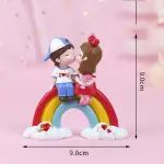 Cute Kissing Couple on Rainbow Cake Toys