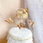 Mom with butterfly cake topper