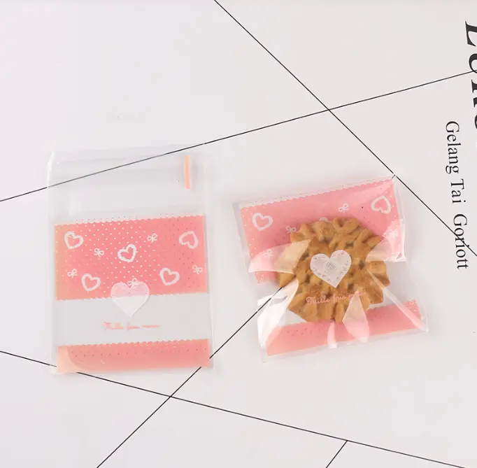 Pink lace hearts 100pcs Cookie Candy Sleeve